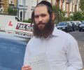 Yehuba with Driving test pass certificate